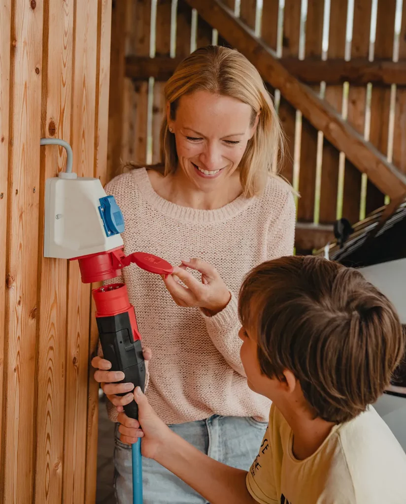 Connect the NRGkick adapter securely to the power source.